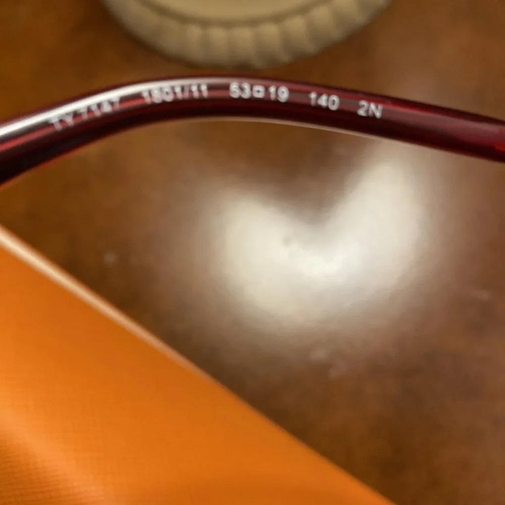 Tory Burch “Cranberry” sunglasses - New with case and dust bag.